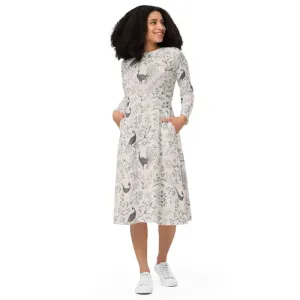 Turn Heads in this Long Sleeve Midi Dress